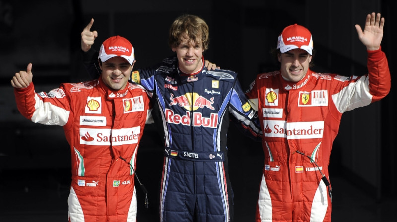 "Ferrari" piloti Felipe Masa un Fernando Alonso kopā ar "Red Bull" braucēju Sebastjanu Fetelu
Foto: AP/ AFP/Scanpix Sweden