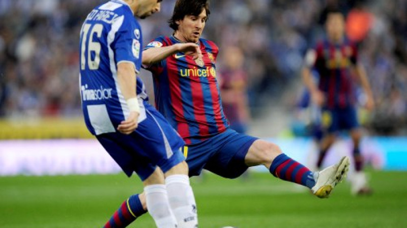 Nikolass Pareha ("Espanyol") un Lionels Mesi ("Barcelona")
Foto: AP/ Scanpix