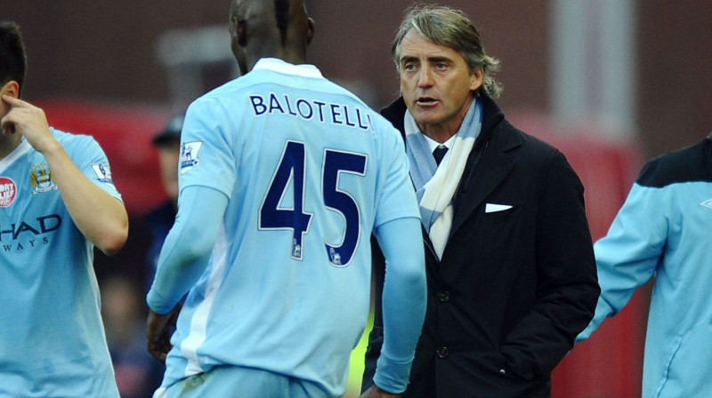 Mario Balotelli un Roberto Mančīni 
Foto: AFP/Scanpix