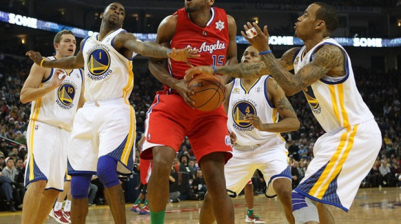 "Los Angeles Clippers" uzbrucējs Raiens Gomess 2011. gada 25. decembra spēlē pret "Golden State Warriors"
Foto: AFP/Scanpix