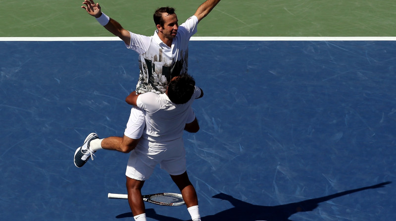 Radeks Štepāneks un Leanders Paess atzīmē uzvaru "US Open"
Foto: AFP/Scanpix