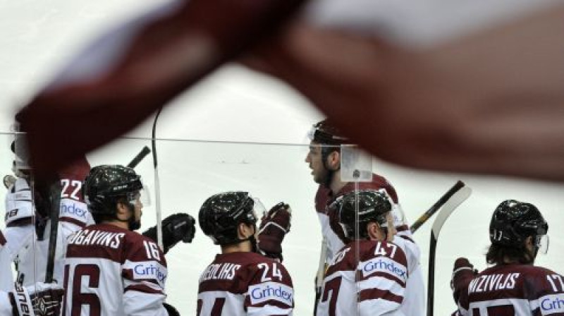 Latvijas izlases hokejisti atzīmē pirmo vārtu guvumu
Foto: Romāns Kokšarovs, Sporta Avīze, f64