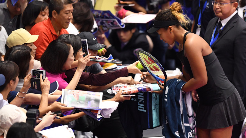 Naomi Osaka un fani. Foto: AFP/Scanpix