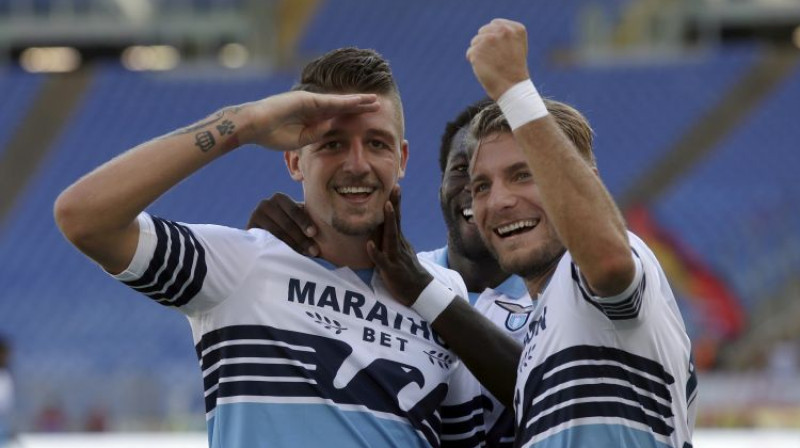 Sergejs Milinkovičs-Savičs un Čīro Immobile. Foto: AP/Scanpix