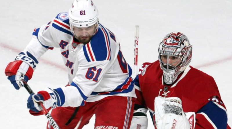 Riks Nešs NHL spēlē pret Monreālu un tās vārtsargu Keriju Praisu. Foto: USA Today Sports/Scanpix