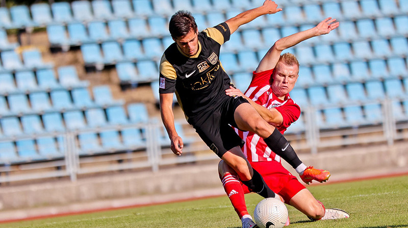 Luka Silagadze cīņā ar Jevgeņiju Berjozkinu. Foto: Jānis Līgats