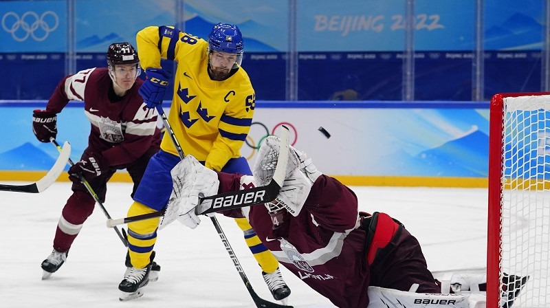 Antons Landers un Ivars Punnenovs brīdī, kad Valmarks guva vārtus. Foto: AP/Scanpix