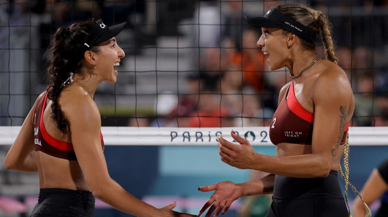 Melisa Humana-Paradesa un Brendija Vilkersone. Foto: AFP/Scanpix