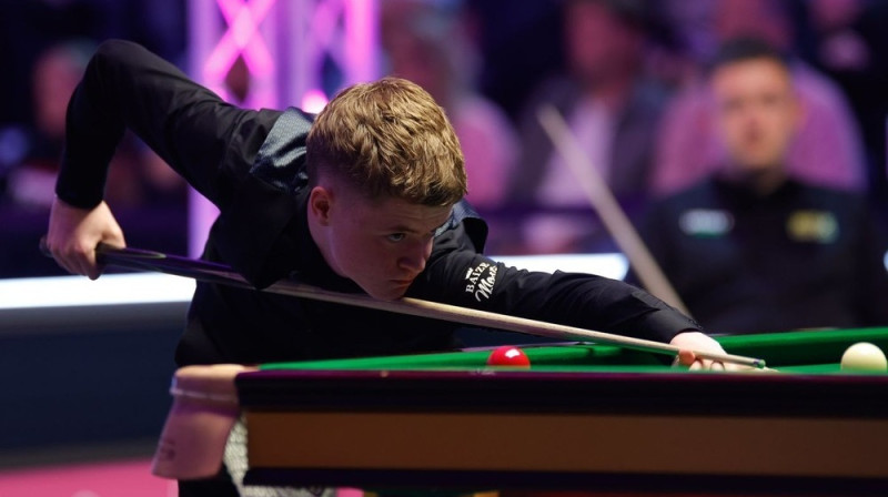 Stens Mūdijs spēlē pret Kairenu Vilsonu "British Open" turnīrā. Foto: WST.