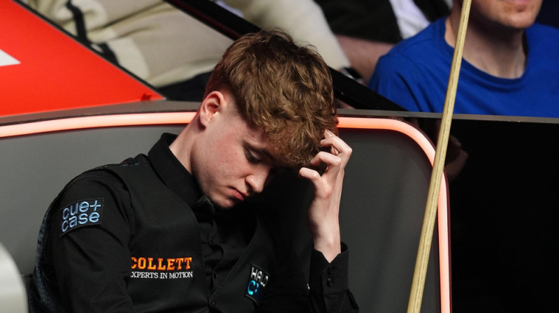 Stens Mūdijs piedzīvo sāpīgu zaudējumu debijas spēlē pasaules čempionāta pamatturnīrā. Foto: Martin Rickett/PA